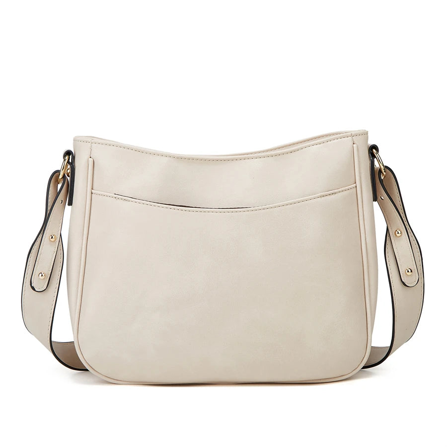 A light beige PU leather shoulder crossbody bag with tan leather trim and hardware.