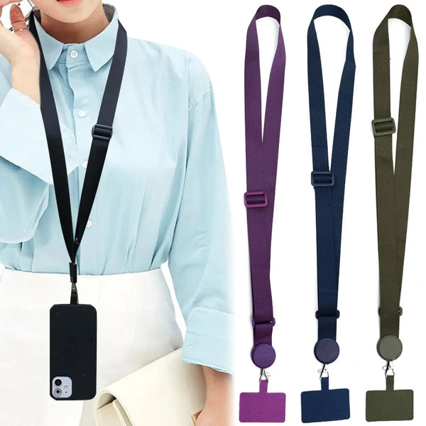 A woman wearing a light blue shirt demonstrates a black phone lanyard with a neck strap and clip.