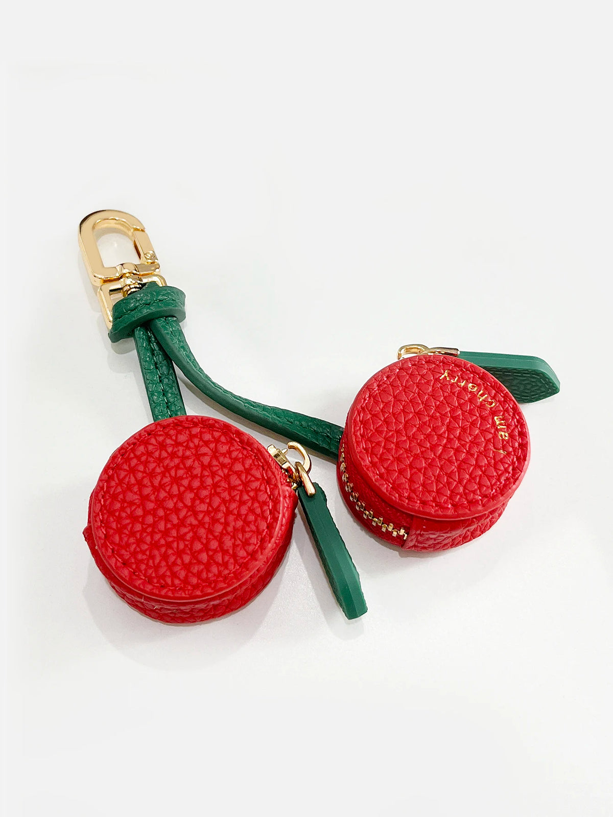 Red cherry fruit shape coin purse keychain with gold hardware and green fabric strap