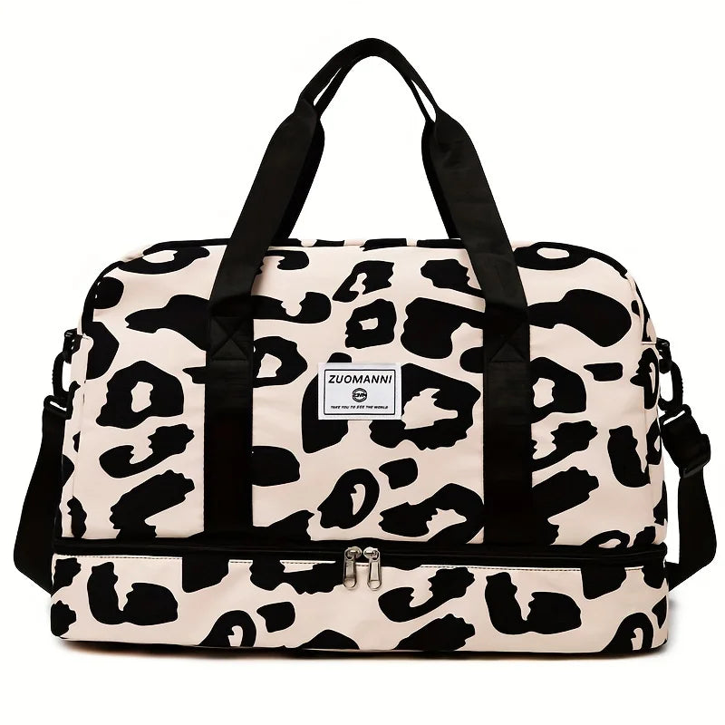 A beige and black leopard print nylon travel duffle bag with black handles.