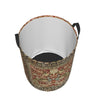 A vintage floral laundry hamper made of woven fabric with a dark rim and black handles.