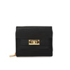 Black leather multi-slot card holder with gold-toned clasp and zipper.