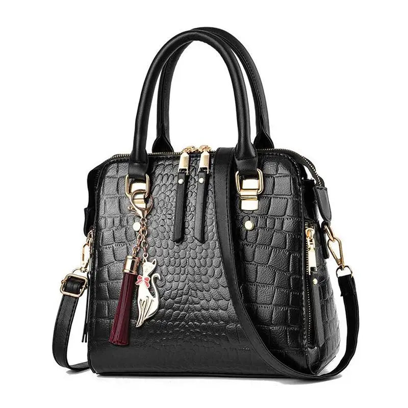 Black crocodile-embossed leather tassel shoulder bag with gold hardware