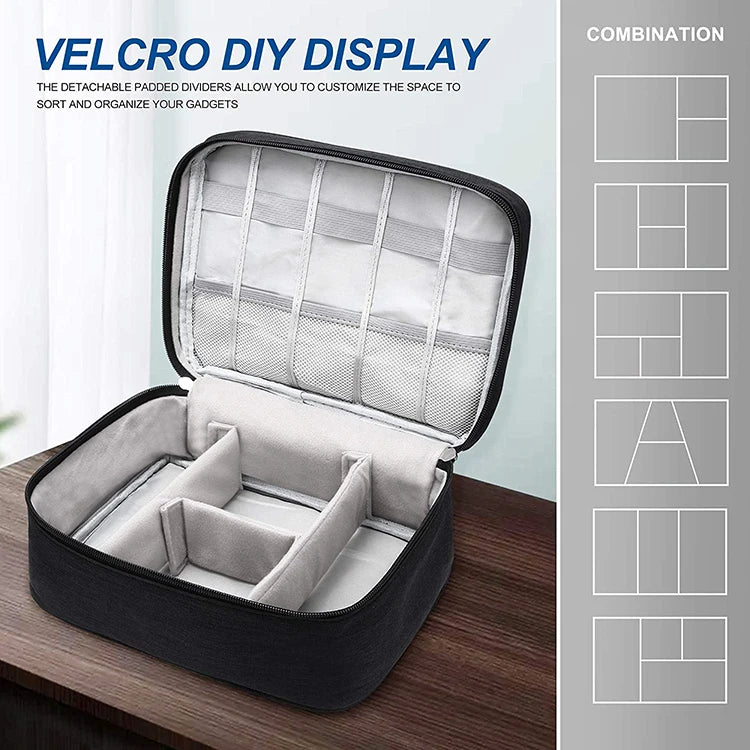 A black Velcro DIY display storage pouch with a padded lid and interior dividers shown on a wooden surface.