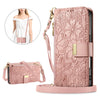 A pink zippered leather crossbody phone wallet case for an iPhone featuring a detailed floral pattern.