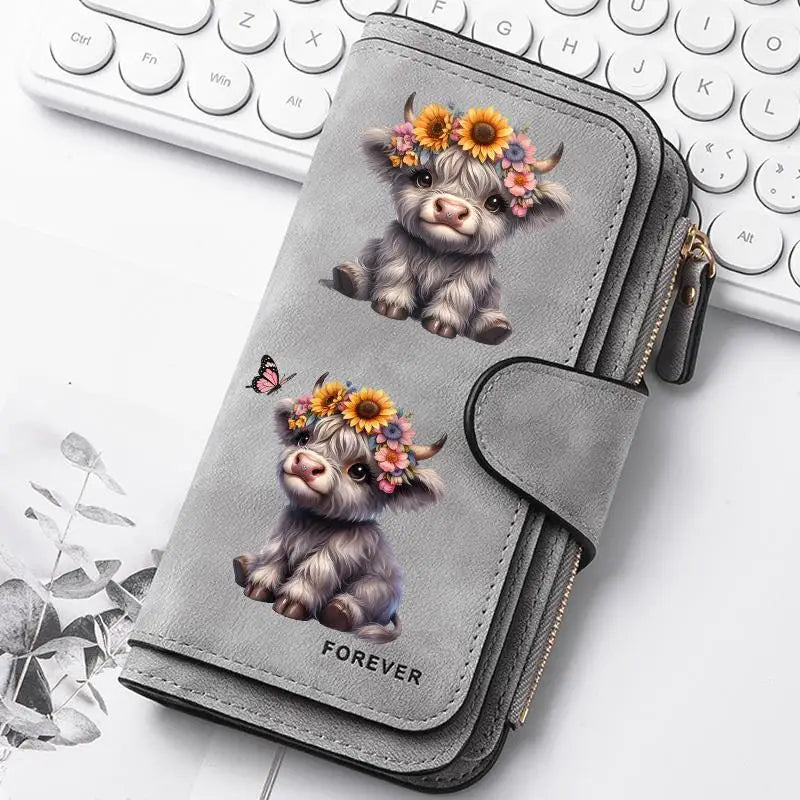 A gray zippered wallet features a cute puppy design with flowers and the word forever printed on it.
