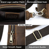 Close-up view of a brown leather patch, removable metal hook, and adjustment buckle on a men's crossbody bag.