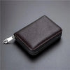 A dark brown leather minimalist RFID blocking card wallet with a zipper pouch shown from above.