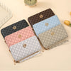 A collection of five multi-functional zipper wallets in various shades of brown, pink, and blue stacked on a light background
