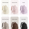 Six color variations of a quilted casual backpack for students including beige, pink, purple, camel, coffee-colored, and blac