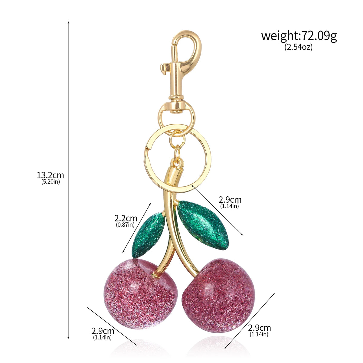 Gold-toned keychain featuring two pink glittery crystal cherries.