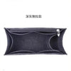 A dark gray felt bag organizer insert with a zipper closure.