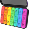 A weekly pill organizer with 7 compartments labeled Sun to Sat, showing different colored pills for morning and night doses.