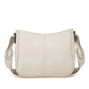 Sac à main en cuir PU beige clair avec une finition lisse et des garnitures en cuir fauve.