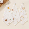 White muslin baby burp cloth towel with scattered animal print designs