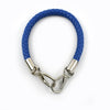 A blue PU leather replacement bag strap with silver metal buckles.