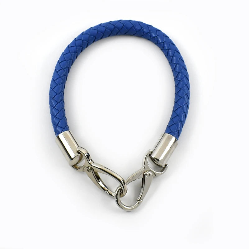 A blue PU leather replacement bag strap with silver metal buckles.