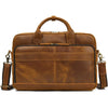 A brown vintage genuine leather briefcase with a leather handle and shoulder strap.