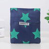 A dark blue fabric pouch with a repeating pattern of bright green stars.