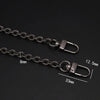 A close-up of a silver metal chain strap with a lobster clasp and jump ring, showing its length and link size.