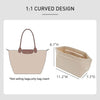A light beige 1:1 curved design felt mini bag organizer pouch for handbags.