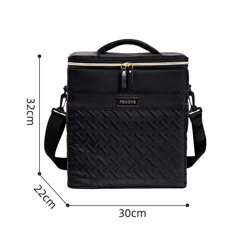 Black insulated picnic cooler backpack with a gold zipper and quilted pattern