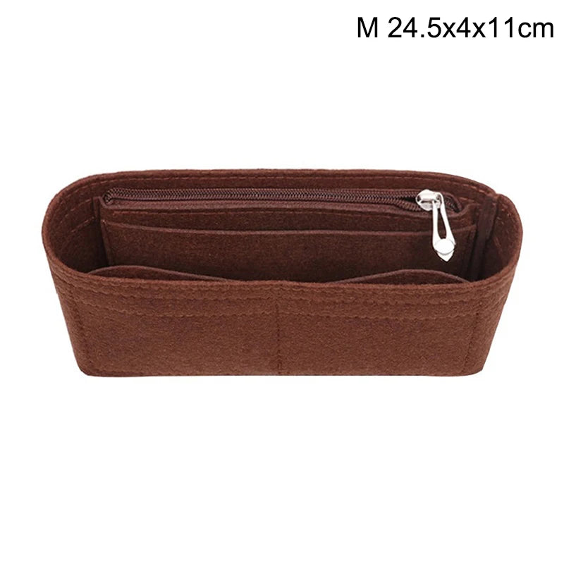 A brown felt bag insert organizer with a zipper and a small pull tab.