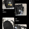 Four variations of a black nylon crossbody bag for teens shown with different features and details.