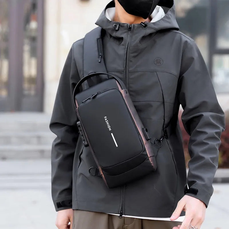 A person wearing a black waterproof jacket is holding an anti-theft crossbody chest bag.