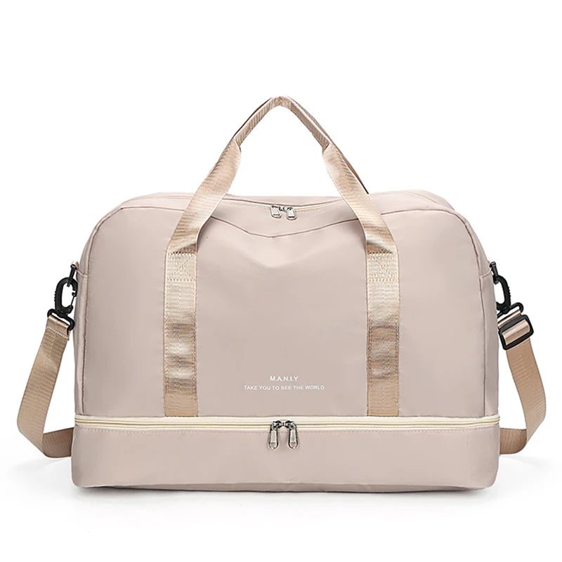 A light beige expandable nylon travel duffle bag with tan straps and zipper visible from the front.