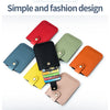 A collection of various colored genuine leather slim card holders displayed on a white background.