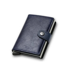 A dark blue slim carbon fiber card holder wallet shown from the side.