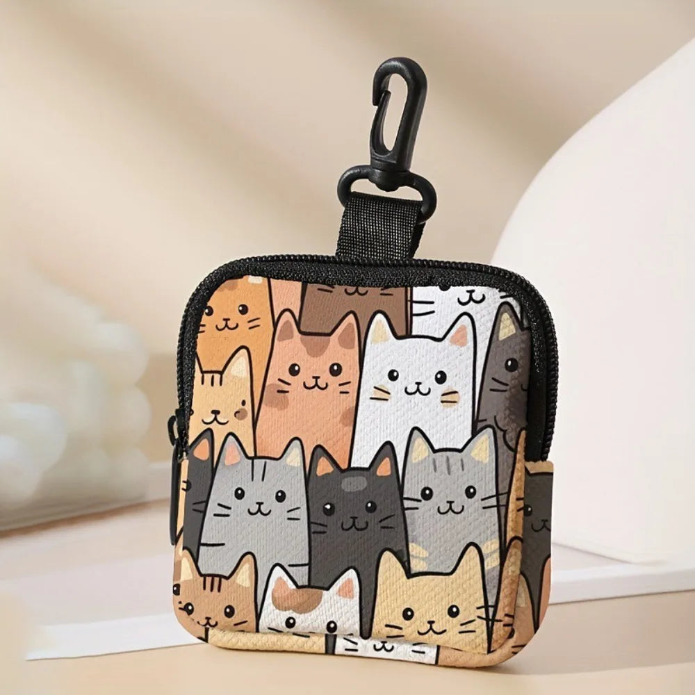 A black zippered pouch featuring a collage of various cat faces in earthy tones and white, with a metal clasp.