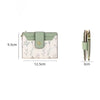 A light green and white patterned PU leather slim card holder wallet with a matching strap.