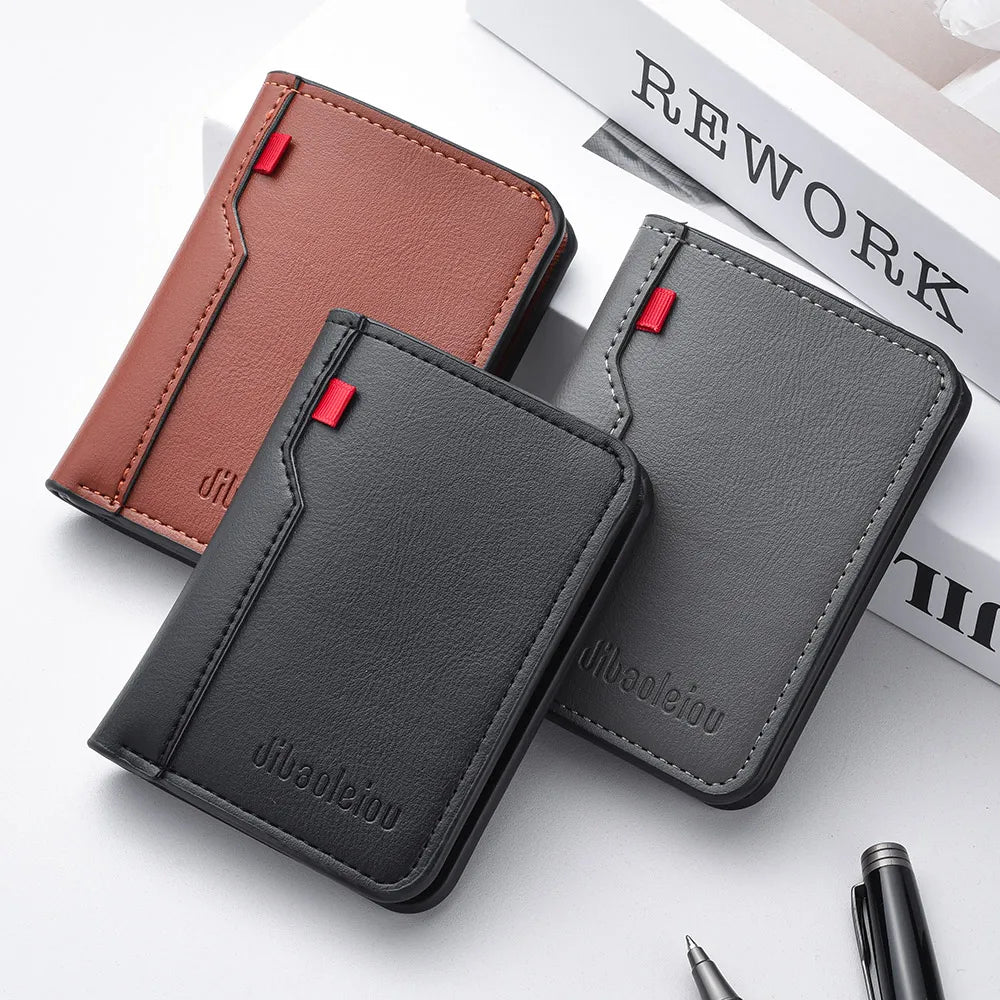 A dark gray ultra-thin PU leather credit card wallet shown next to a brown version and a book.