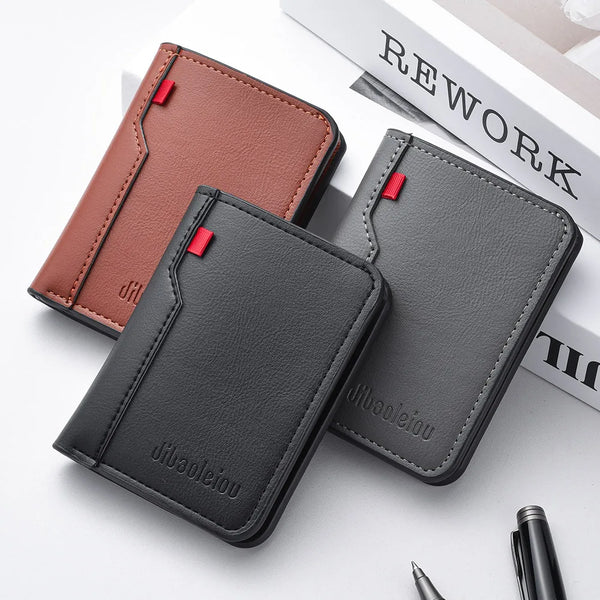 A dark gray ultra-thin PU leather credit card wallet shown next to a brown version and a book.