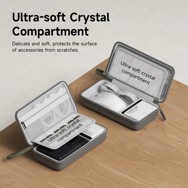 Organizador portátil de compartimento de cristal gris que protege accesorios de arañazos.