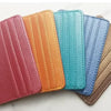 A row of five slim PU leather mini wallets in various shades including red, orange, teal, purple, and tan.