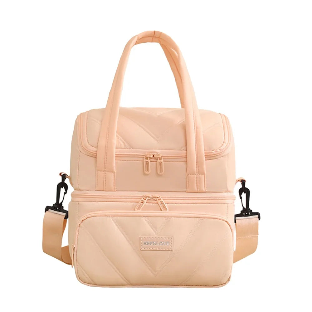 Bolsa reutilizable aislada beige con detalles rosas y asa de transporte.