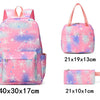 Pink and purple multi-compartment backpack set with a matching pouch and strap