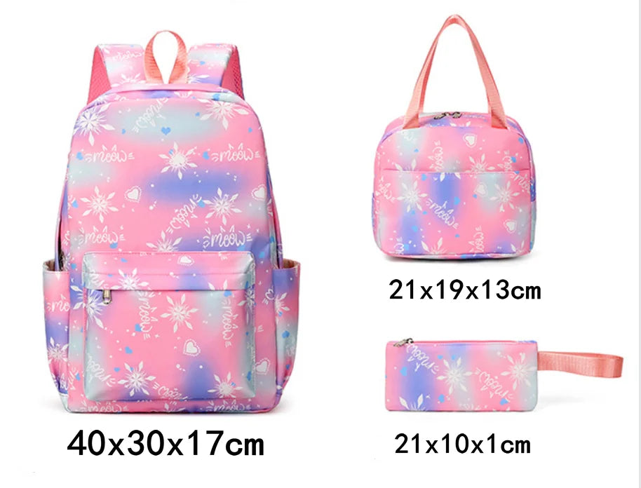 Pink and purple multi-compartment backpack set with a matching pouch and strap