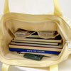Bolso cruz de encaje amarillo pálido Y2K con bolsillo transparente para libros y smartphone.