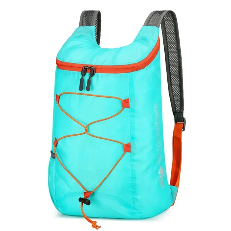 A bright cyan outdoor folding backpack with black straps and orange accents.
