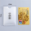 A white anti-RFID blocking card holder and a gold colored bank card are shown against a gray background.