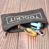 A black tool organizer bag with a clear window showing various tools including pliers and a screwdriver.