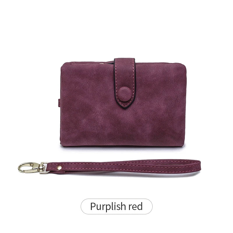 A plum purple card wallet with a leather strap shown next to the product.