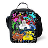 Un sac à dos noir avec un motif de gorille de la marque Tag et des couleurs vives.