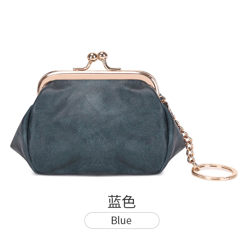 A dark blue leather coin purse with a gold-toned clasp and chain attached.