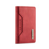 A vertical, reddish-pink trifold magnetic card holder wallet with a stitched edge.