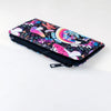 A colorful, patterned bifold wallet with a zipper and an ID window is shown lying flat.